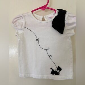 Girl’s white cotton tee with image of dog on a leash